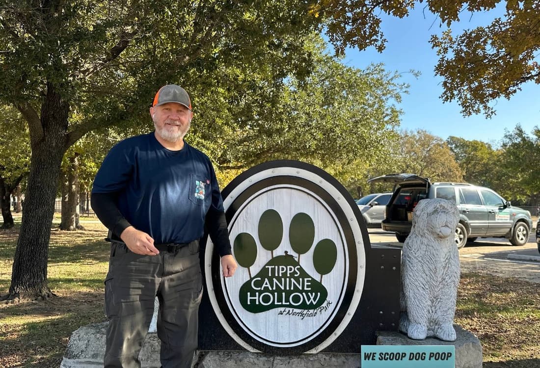 A happy customer dog jumping up on Paul in North Richland Hills, Texas